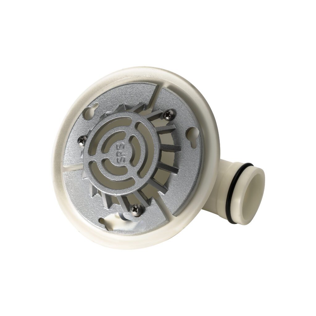 A close-up of a round plastic and metal plumbing fitting with a side outlet and O-rings, featuring a silver grill and screws on the top surface.