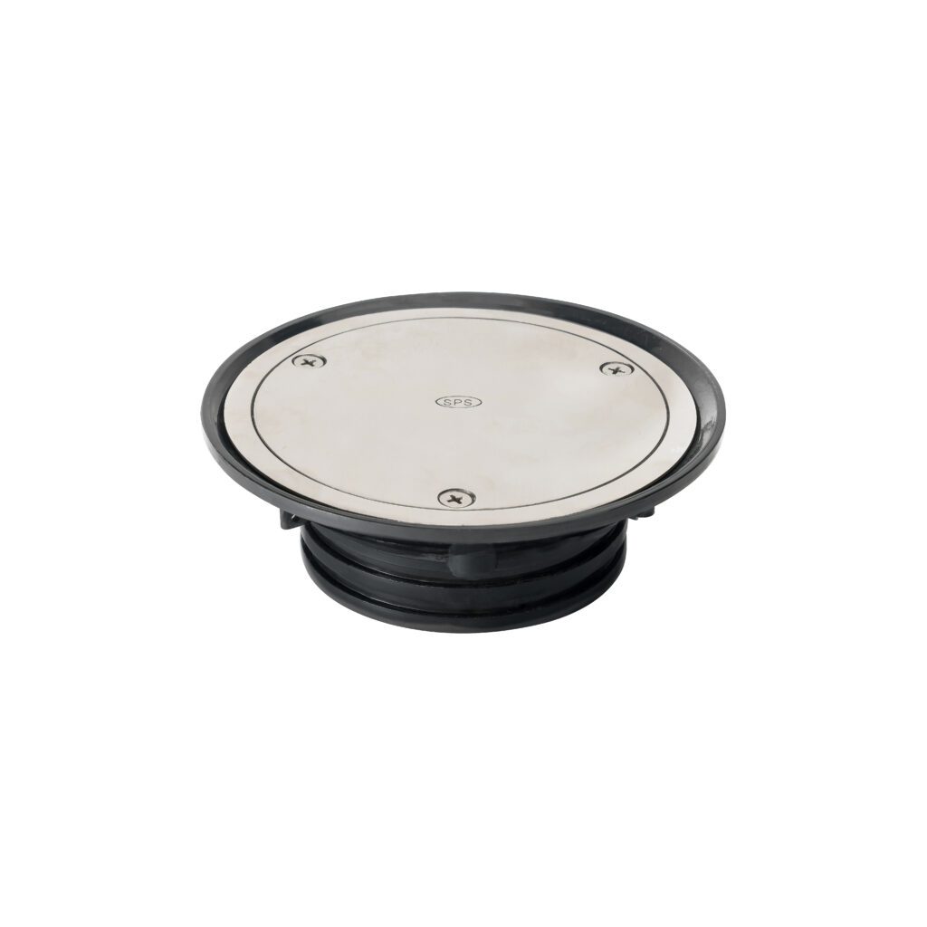 A round, metallic floor drain cover with four screws securing it, set in a black circular base, isolated on a white background.